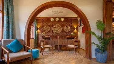 a room with a table and chairs