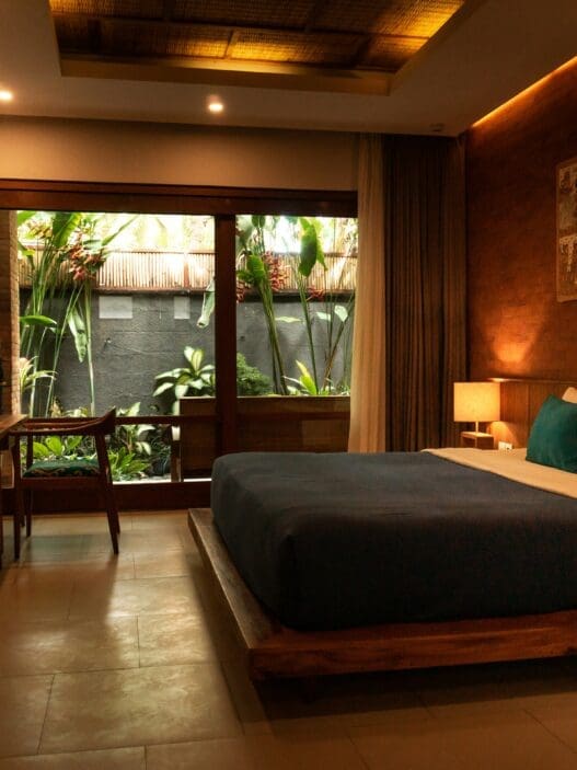 a bedroom with a bed and a desk