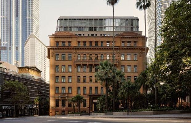 a building with palm trees