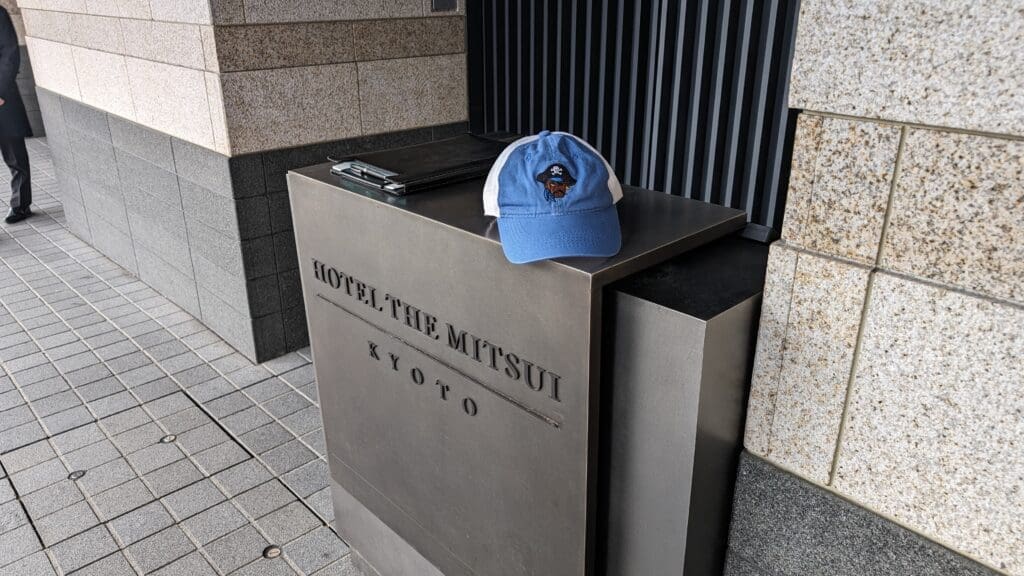 a hat on a metal box