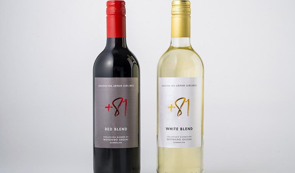 a bottle of wine next to a bottle of wine