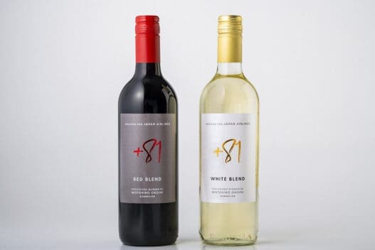 a bottle of wine next to a bottle of wine