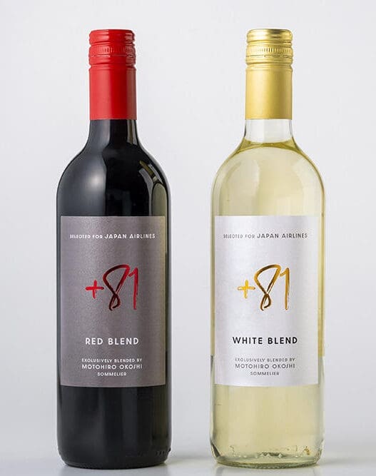 a bottle of wine next to a bottle of wine