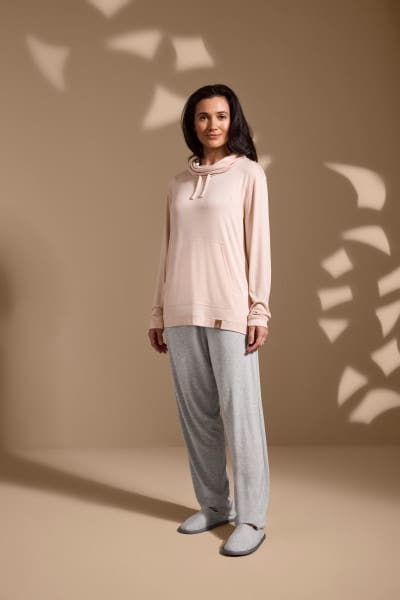 a woman standing in a room