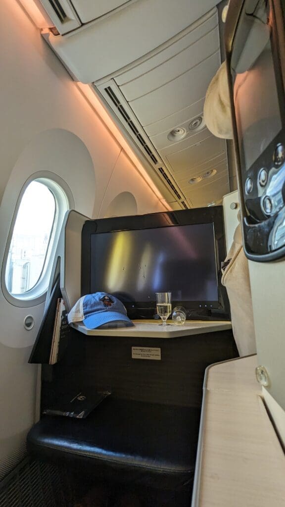 a tv on a table in an airplane