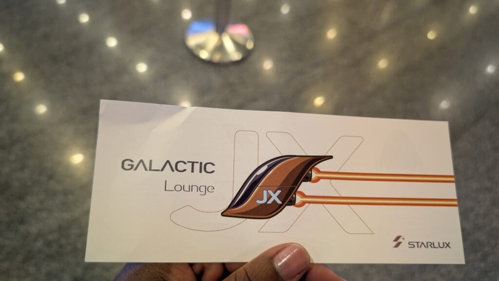 a hand holding a card