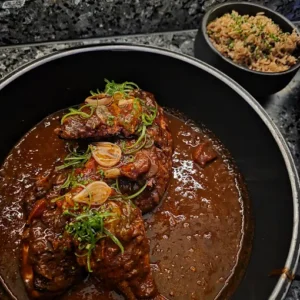 a bowl of food on a stove