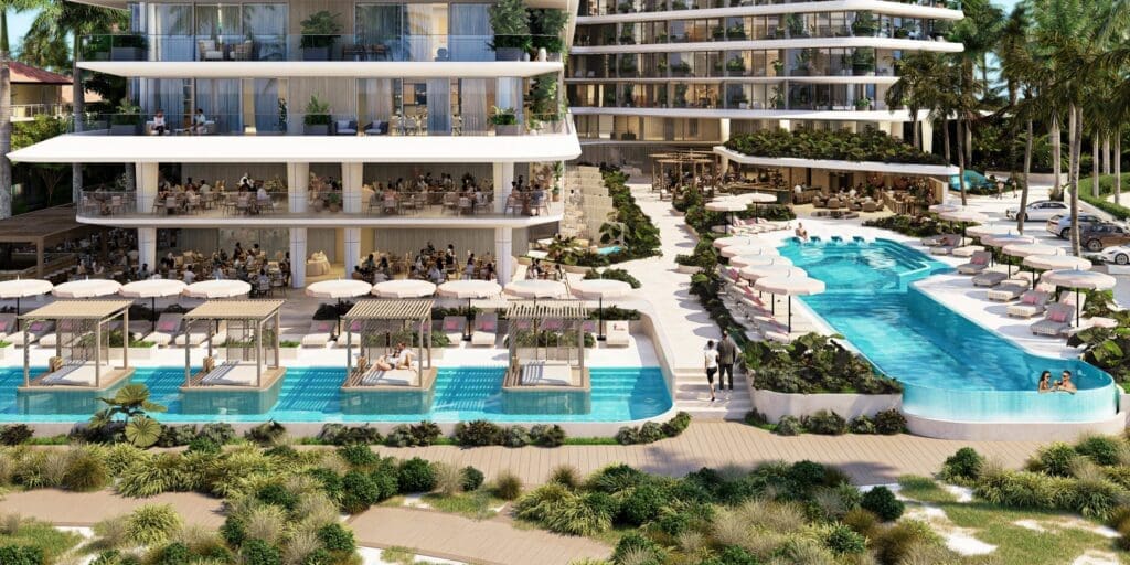 a pool and a building with people walking by