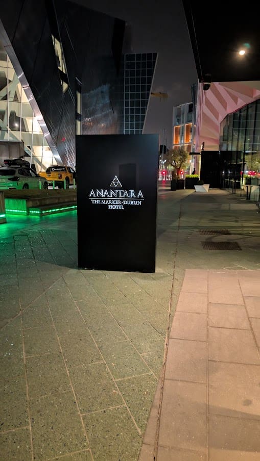 a sign on a sidewalk