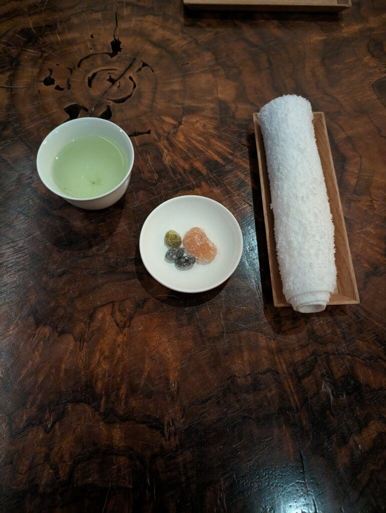 a bowl of water and a bowl of jelly on a table