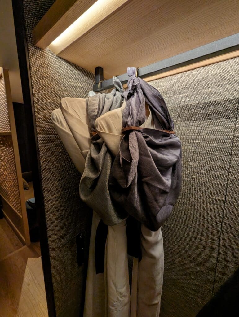 a group of clothes on a rack