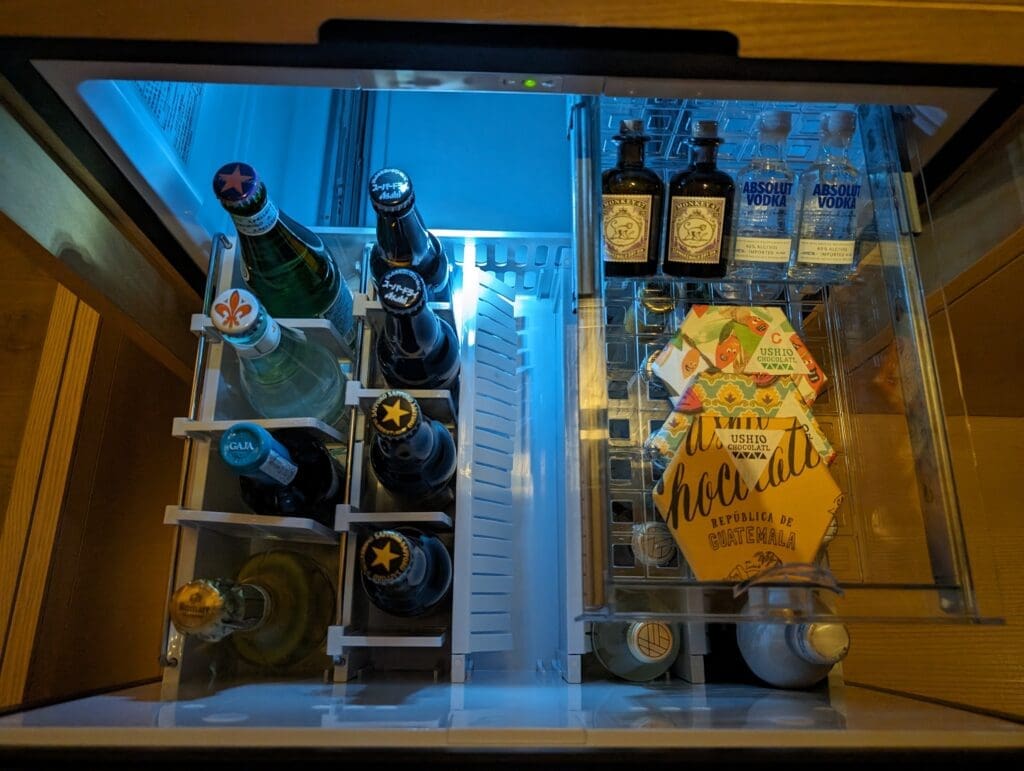 a fridge with bottles of alcohol inside
