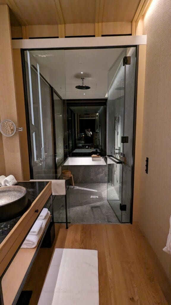 a bathroom with a tub and sink