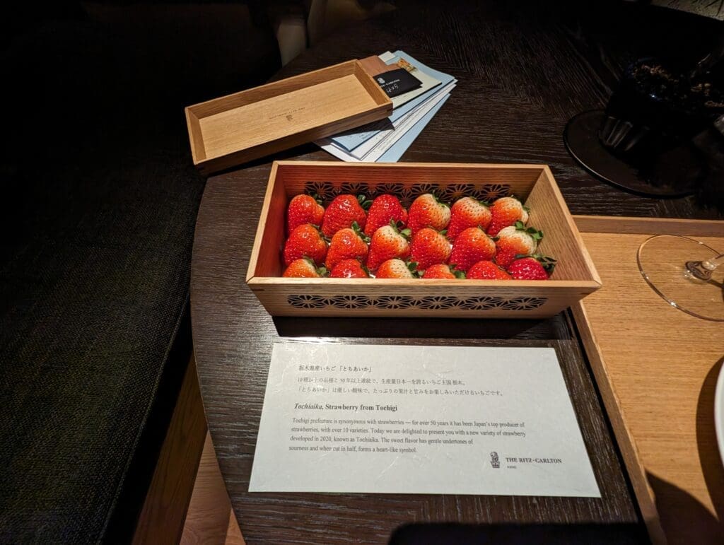 a box of strawberries on a table