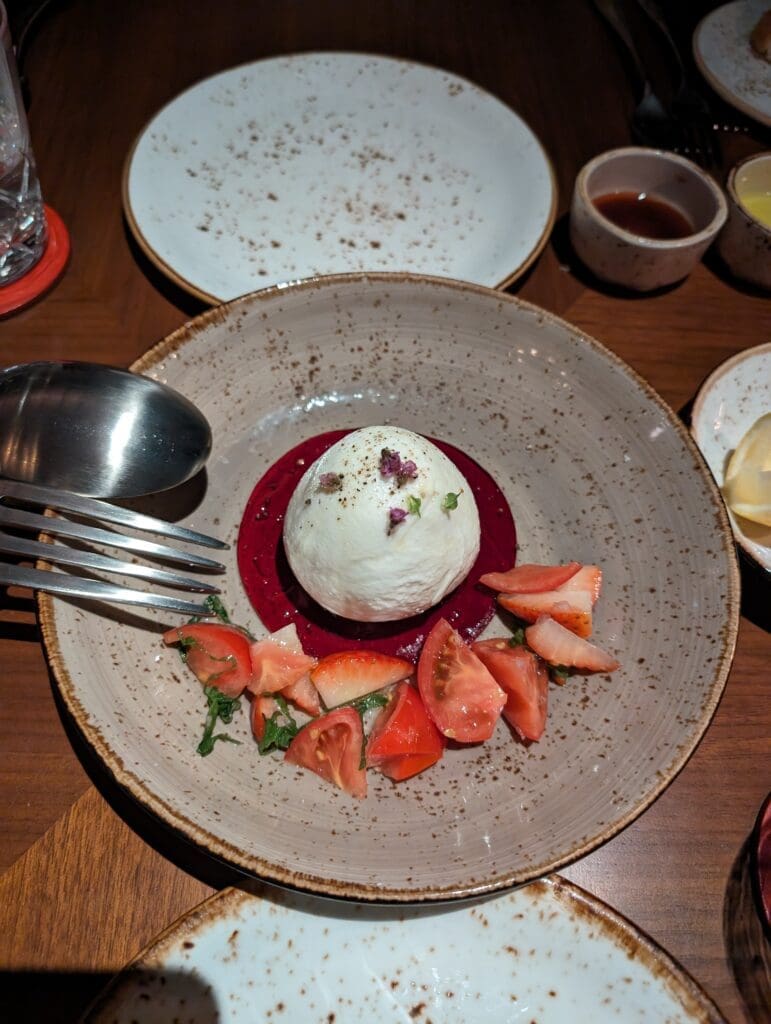 a plate of food with a fork and spoon