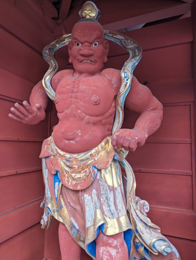 a statue of a man in a red box