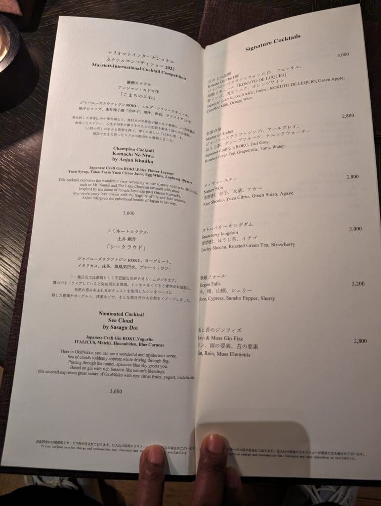 a hand holding a piece of paper