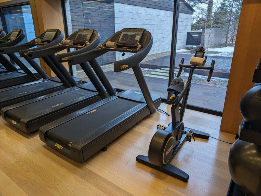 a group of treadmills in a room