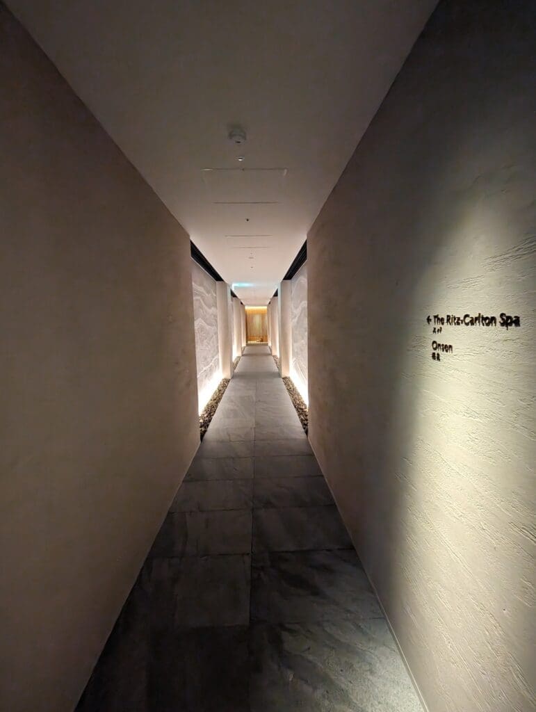 a long hallway with lights
