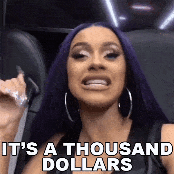 a woman with purple hair and big earrings