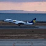 a plane taking off from a runway