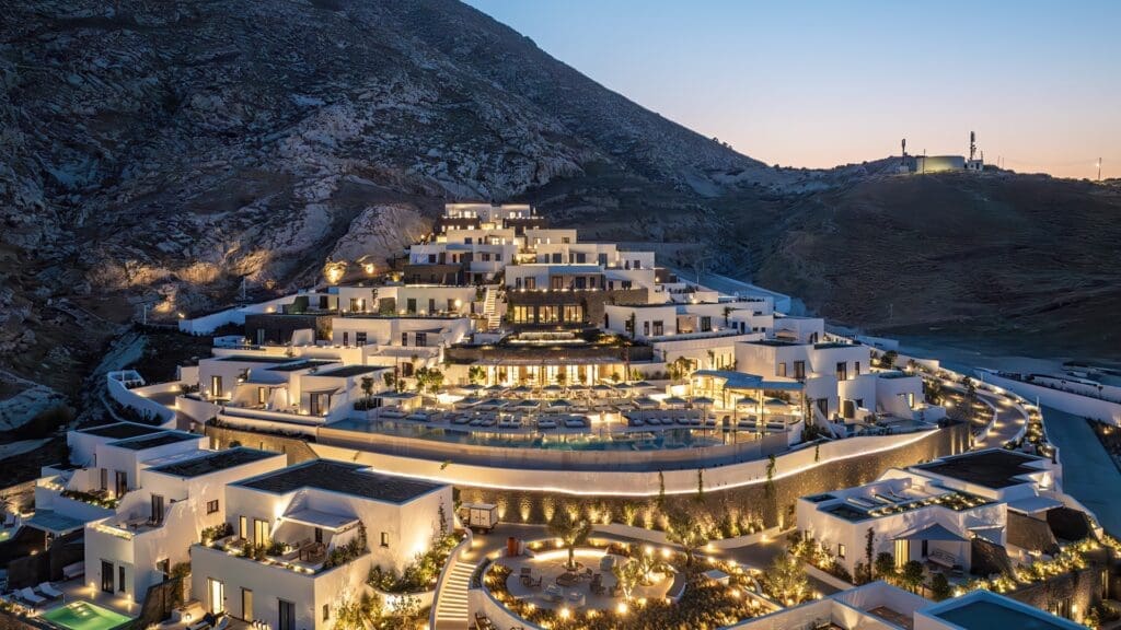 a large white building with lights on it