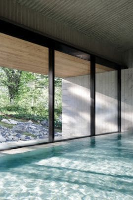 a swimming pool with a large window