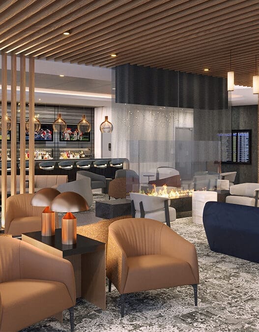 a lobby with a fireplace and chairs