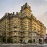 a large building with many windows with Langham Hotel, London in the background