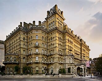 a large building with many windows with Langham Hotel, London in the background