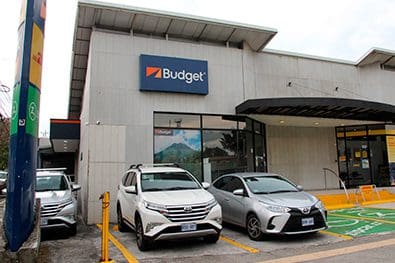 a building with cars parked in front of it