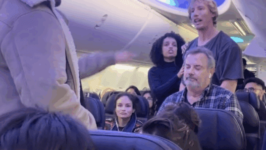 a group of people in an airplane