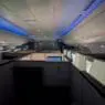 an airplane with cubicles and lights