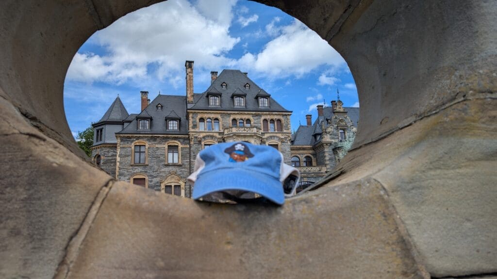 a hat on a stone wall