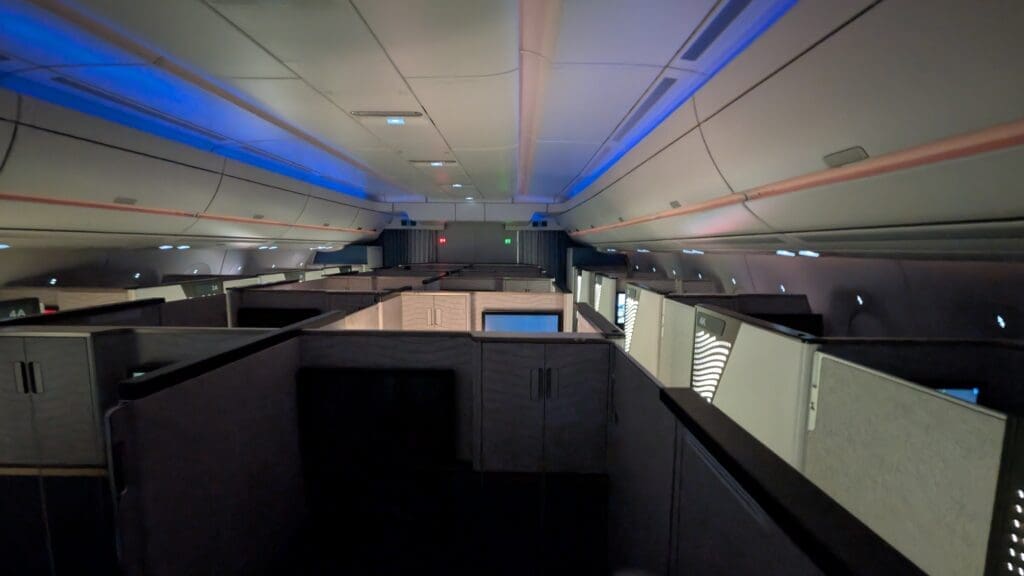 an airplane with cubicles and lights