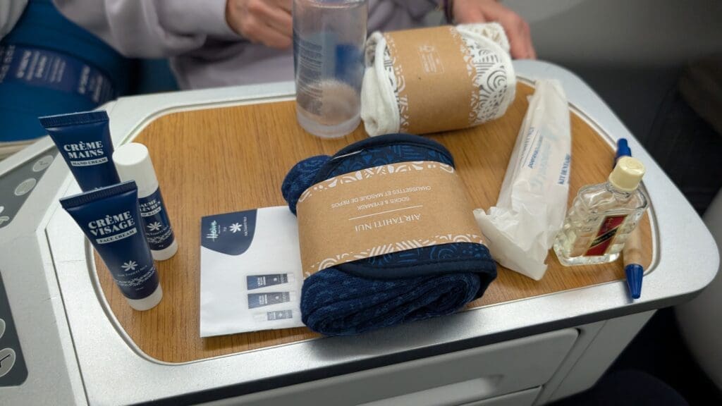 a group of rolled up blankets on a table