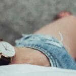 a wrist watch on a person's wrist