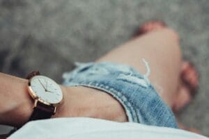 a wrist watch on a person's wrist