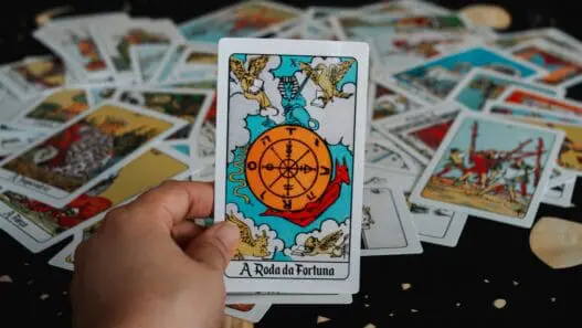 a hand holding a card