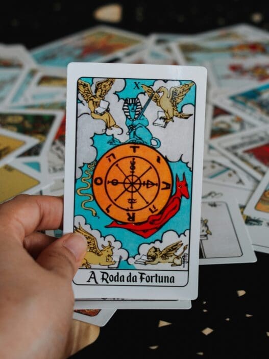 a hand holding a card