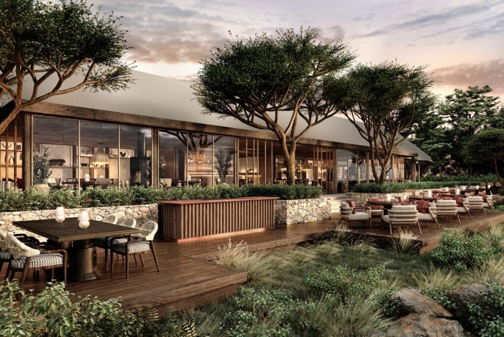 a building with a wooden deck and trees