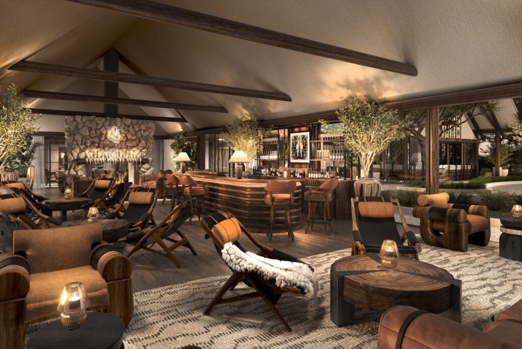 a room with a bar and chairs