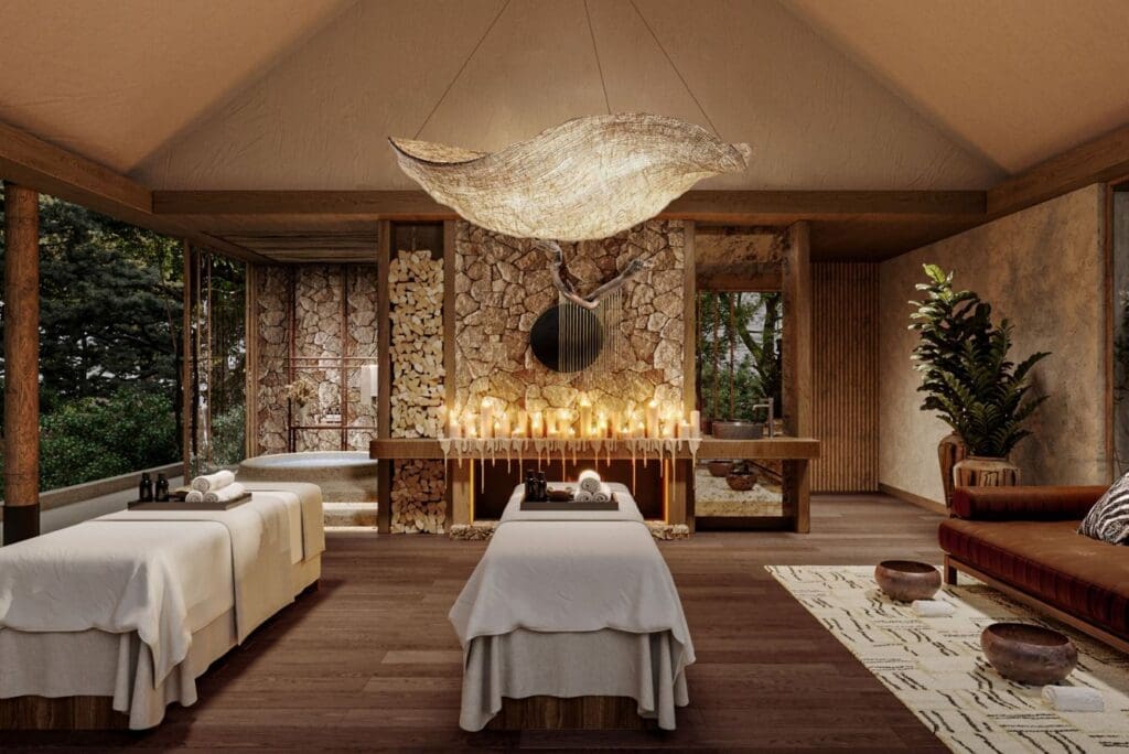 a room with a massage table and candles