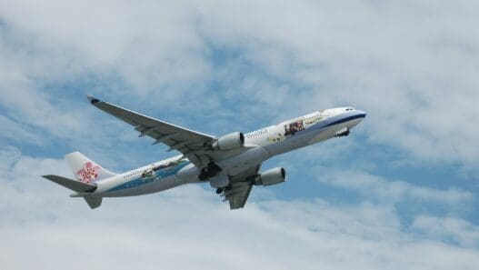 a plane flying in the sky