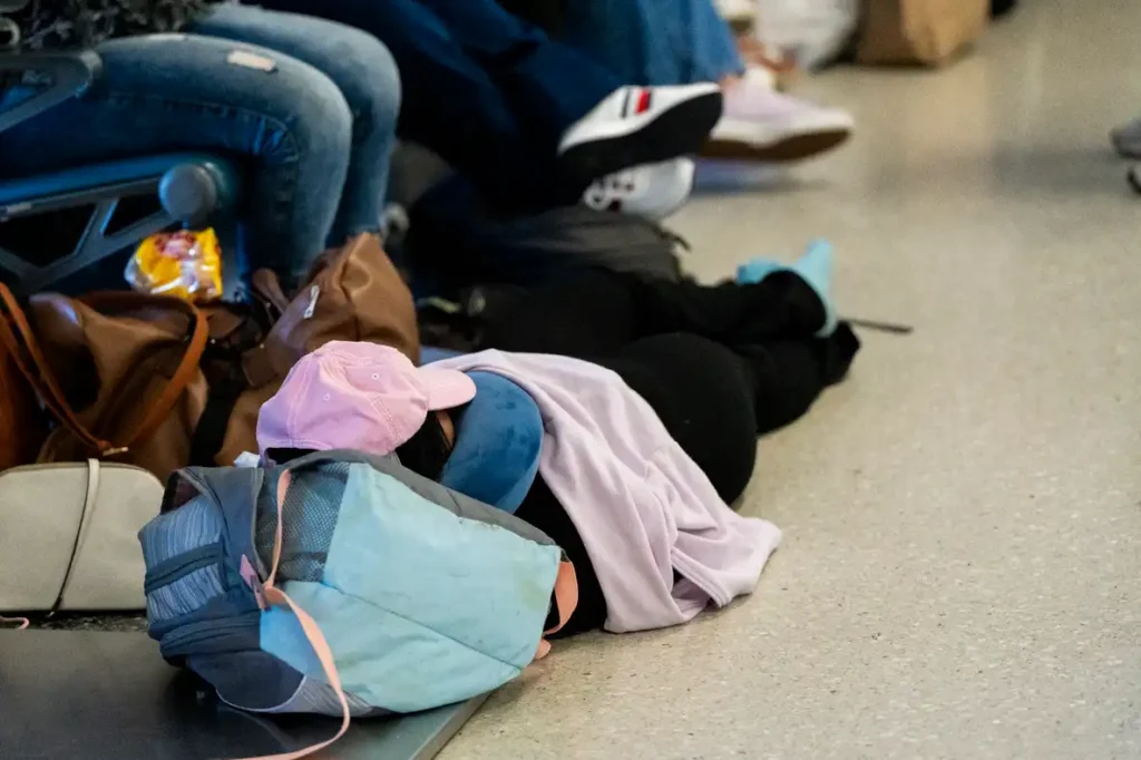 a group of people sitting on the floor