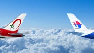 two planes flying above the clouds