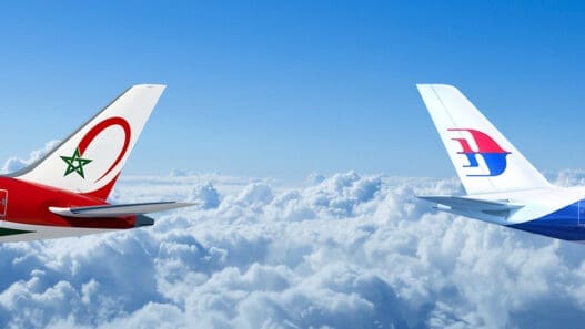 two planes flying above the clouds