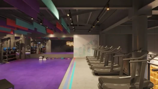 a gym with treadmills and exercise equipment