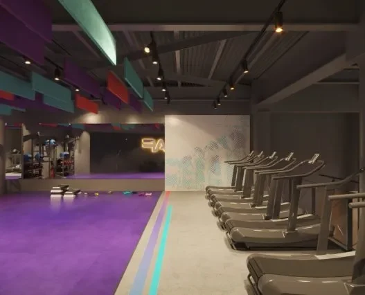 a gym with treadmills and exercise equipment