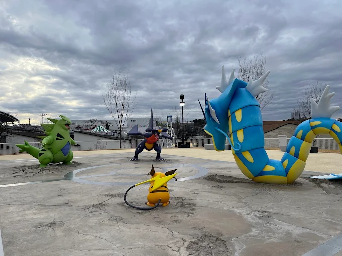 a group of cartoon characters in a park